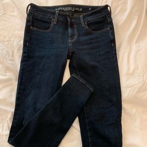 Mid rise, dark wash skinny jeans